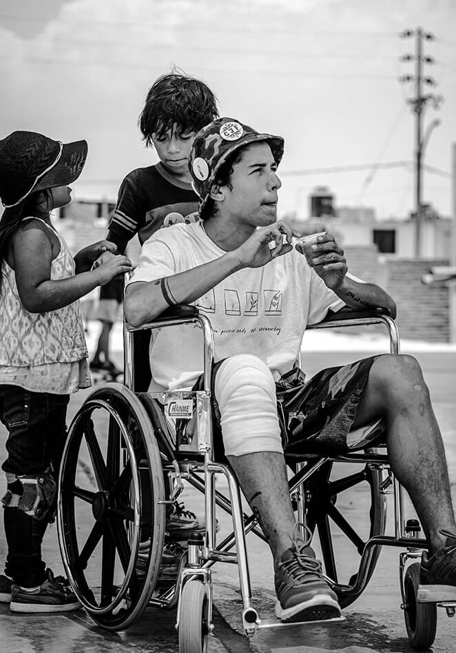 Foncho in a wheelchair in Alto Trujillo Skatepark in Peru