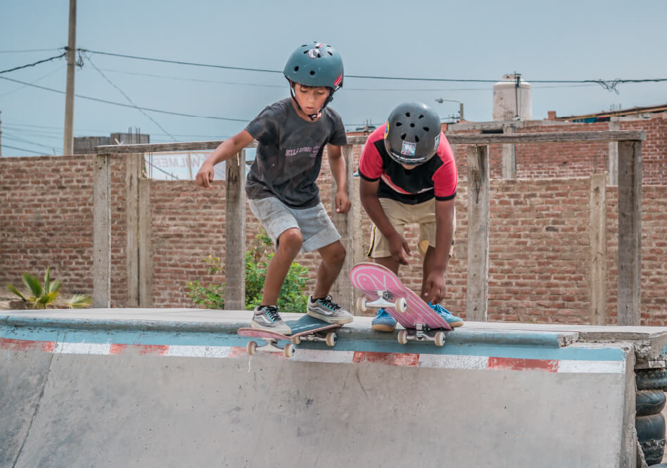 Children dropping in Peru with Mr. Andre's board from The Skateroom