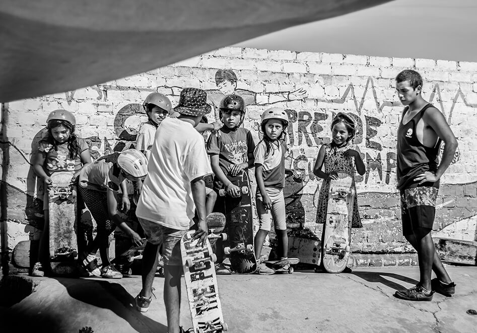 Children skateboarding in Peru