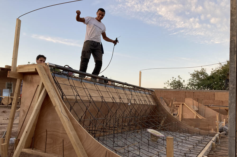Jhikson Akamine buildind the Fiers et Forts Skatepark in Morocco, 2022