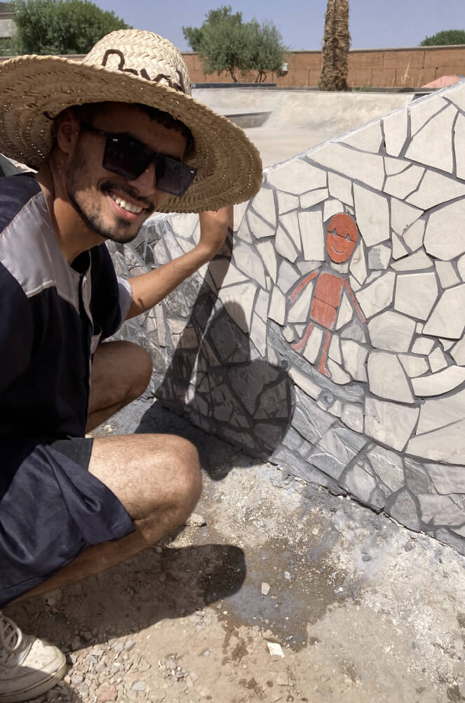 Kamal in fron the mosaic at the Fiers et Forts Skatepark in Morocco