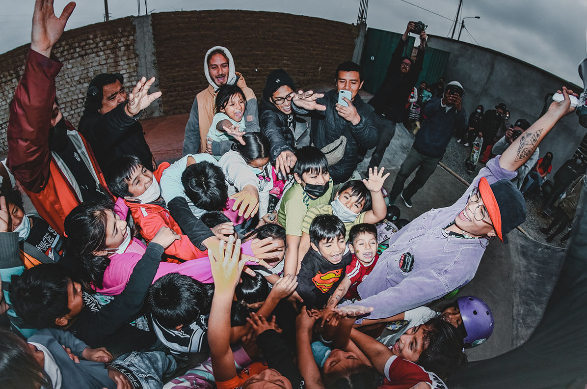 Group pictures of children and young adults during the opening day of 'La Rampa' in Cerrito de la Virgen, Peru