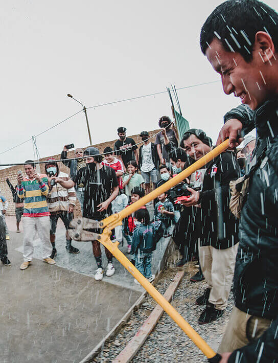 Apprentice in Peru cutting a rebar during the opening day of the new Cerrito's skatepark.